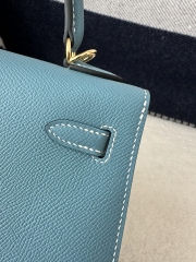 Kelly 25cm in imported Epsom grained leather, CC75 Blue Jean (denim blue) with gold hardware.