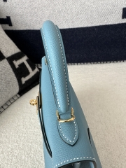 Kelly 25cm in imported Epsom grained leather, CC75 Blue Jean (denim blue) with gold hardware.