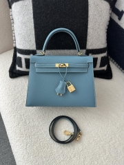 Kelly 25cm in imported Epsom grained leather, CC75 Blue Jean (denim blue) with gold hardware.