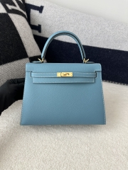 Kelly 25cm in imported Epsom grained leather, CC75 Blue Jean (denim blue) with gold hardware.