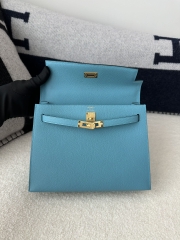 Kelly 25cm in imported Epsom grained leather, P3 Blue du Nord (northern blue) with gold hardware.