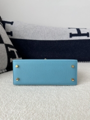 Kelly 25cm in imported Epsom grained leather, P3 Blue du Nord (northern blue) with gold hardware.