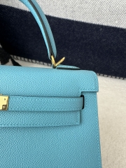 Kelly 25cm in imported Epsom grained leather, P3 Blue du Nord (northern blue) with gold hardware.