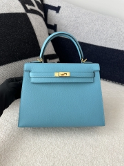 Kelly 25cm in imported Epsom grained leather, P3 Blue du Nord (northern blue) with gold hardware.