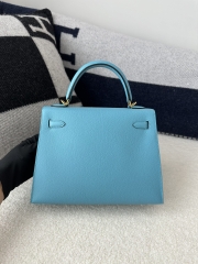 Kelly 25cm in imported Epsom grained leather, P3 Blue du Nord (northern blue) with gold hardware.