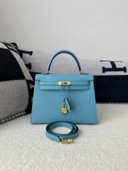Kelly 25cm in imported Epsom grained leather, P3 Blue du Nord (northern blue) with gold hardware.
