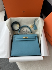 Kelly 25cm in imported Epsom grained leather, P3 Blue du Nord (northern blue) with gold hardware.