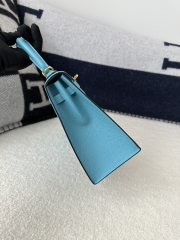 Kelly 25cm in imported Epsom grained leather, P3 Blue du Nord (northern blue) with gold hardware.
