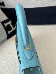 Kelly 25cm in imported Epsom grained leather, P3 Blue du Nord (northern blue) with gold hardware.