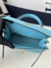 Kelly 25cm in imported Epsom grained leather, P3 Blue du Nord (northern blue) with gold hardware.