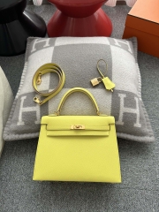 Kelly 25cm in imported Epsom grained leather, 9R Lime (lemon yellow)  with gold hardware.