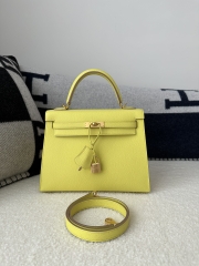 Kelly 25cm in imported Epsom grained leather, 9R Lime (lemon yellow)  with gold hardware.