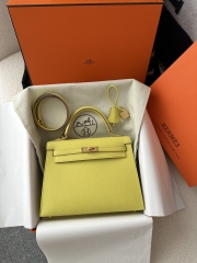 Kelly 25cm in imported Epsom grained leather, 9R Lime (lemon yellow)  with gold hardware.