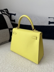 Kelly 25cm in imported Epsom grained leather, 9R Lime (lemon yellow)  with gold hardware.