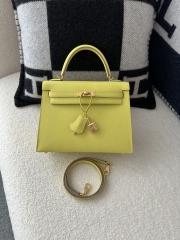 Kelly 25cm in imported Epsom grained leather, 9R Lime (lemon yellow)  with gold hardware.