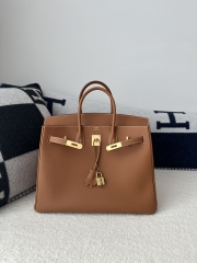 Birkin 35cm in imported Togo calfskin leather, CC37 Gold (classic brown) with gold hardware.