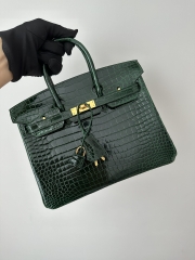 Birkin 25cm in Shiny Porosus Crocodile, imported HCP water-dyed glossy crocodile skin, CC67 Vert Fonce Emerald Green with Gold Hardware.