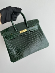 Birkin 25cm in Shiny Porosus Crocodile, imported HCP water-dyed glossy crocodile skin, CC67 Vert Fonce Emerald Green with Gold Hardware.