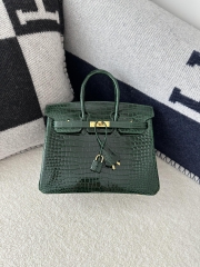 Birkin 25cm in Shiny Porosus Crocodile, imported HCP water-dyed glossy crocodile skin, CC67 Vert Fonce Emerald Green with Gold Hardware.