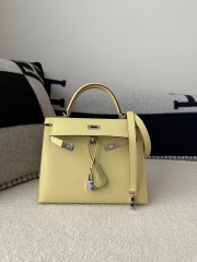 Kelly 25cm in Imported Epsom Leather, 1Z Jaune Poussin Chick Yellow with Silver Hardware