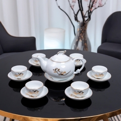 Bộ ấm chén sứ trắng hoa sen vàng