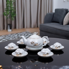 Bộ ấm chén sứ trắng hoa sen vàng