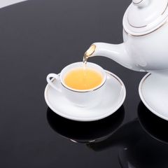 Bộ ấm chén sứ trắng viền vàng