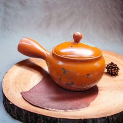 Ấm tokoname khắc hoa đào lọc lưới