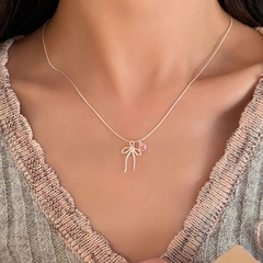Dây chuyền bạc nơ mặt đá hồng thạch