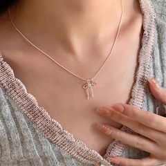 Dây chuyền bạc nơ mặt đá hồng thạch
