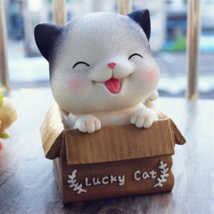Trang trí mèo ngồi giỏ cười tít mắt (lò xo)