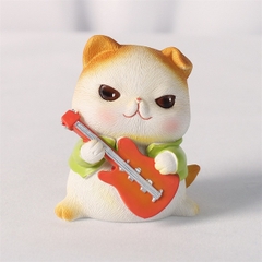 Trang trí sứ mèo tai vàng chơi guitar