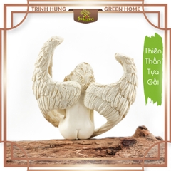 Tượng thiên thần tựa gối