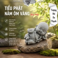 Tượng tiểu phật nằm ôm vàng đá sa thạch