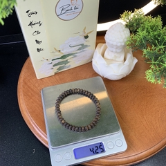 Vòng tay trầm hương Kỳ Hải Nam hạt bàn tính đơn tay nữ 6li nặng 4gram cận chìm dầu đen 050