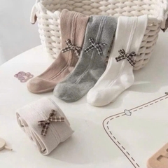 Quần tất có bàn nơ