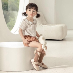 Tất nơ cao cổ bé gái