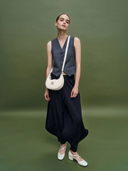 Trice Metallic Accent Belted Curved Shoulder Bag