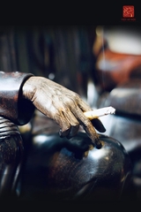 BÁC HỒ NGỒI GHẾ MÂY