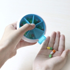 Hộp thuốc tròn 7 ngăn nhấn xoay Fasola RY167