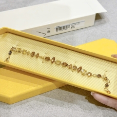 SWAROVSKI Gema bracelet (Mixed cuts, Yellow, Gold-tone plated) - Vòng, lắc tay, đính mix pha lê, tone vàng-nâu - JEWELRY BRACELET