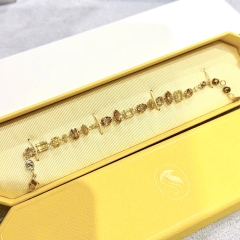 SWAROVSKI Gema bracelet (Mixed cuts, Yellow, Gold-tone plated) - Vòng, lắc tay, đính mix pha lê, tone vàng-nâu - JEWELRY BRACELET