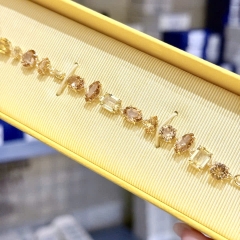 SWAROVSKI Gema bracelet (Mixed cuts, Yellow, Gold-tone plated) - Vòng, lắc tay, đính mix pha lê, tone vàng-nâu - JEWELRY BRACELET