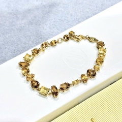 SWAROVSKI Gema bracelet (Mixed cuts, Yellow, Gold-tone plated) - Vòng, lắc tay, đính mix pha lê, tone vàng-nâu - JEWELRY BRACELET
