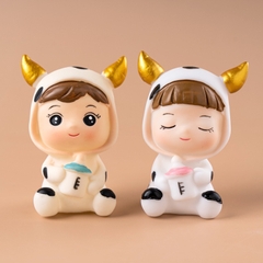 Em bé bò sữa