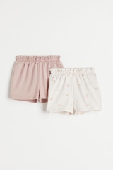 Quần shorts (2 quần) trắng ngà / hoa nhí