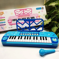 Đàn 32 phím xanh, hồng