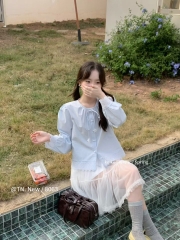 Áo kiểu  thô cổ tròn buộc nơ ren gấu chân áo