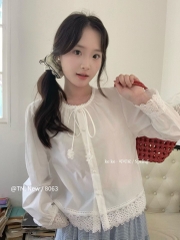 Áo kiểu  thô cổ tròn buộc nơ ren gấu chân áo