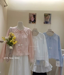 Áo kiểu  thô cổ tròn buộc nơ ren gấu chân áo
